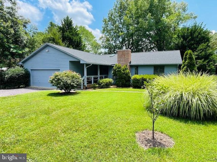 Welcome to your serene retreat nestled by the 4th tee of the golf course, where comfort and style harmonize in this inviting one-level rambler.

As you step through the front door, you enter a tiled foyer that leads to the open living room and dining area. Perfect for welcoming you with a sense of spaciousness and warmth. The vaulted ceiling adorned with a skylight infuses natural light, accentuating the charm of the brick fireplace crowned with propane logs, perfect for cozy evenings with loved ones.

The heart of the home, the kitchen, boasts ample space and functionality, seamlessly flowing into a bright breakfast area under a cathedral ceiling. Whether it's morning coffee or a casual meal, this space invites you to linger and savor each moment. A new cooktop stove was recently installed.

Tucked away for privacy, the primary bedroom features a bonus sunroom, offering a tranquil oasis for relaxation or personal retreat. Imagine waking up to the soft glow of sunlight filtering through the windows. The Primary bathroom features a skylight for brightness!

Step outside onto the screened-in porch, where summer enjoyment awaits. Whether it's lounging with a book, entertaining guests, or simply basking in the beauty of nature, this versatile space is a sanctuary for all seasons.

Venture further into the peaceful patio area, where panoramic views of the golf course unfold before you. From morning coffee to evening cocktails, this outdoor haven beckons you to unwind and savor the idyllic surroundings.

With a two-car garage providing convenience and storage, every aspect of this home has been thoughtfully designed to elevate your lifestyle. Welcome home to a haven of comfort, elegance, and tranquility.
