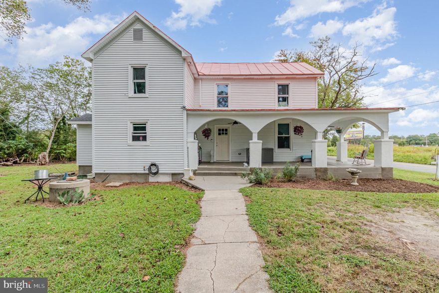 Charming farmhouse-style home on a half-acre lot, blending classic appeal with modern upgrades. Built in 1970, this 2337 sq ft home with 3 bedrooms, 2 bathrooms with new windows, metal roof, and stunning hardwood floors throughout the main living areas. Bathrooms feature elegant marble upgrades, and the inviting front porch is perfect for relaxing or enjoying the outdoors. Additional highlights include an outbuilding for storage or hobbies, and ample outdoor space for entertaining or gardening. This one is a must see!