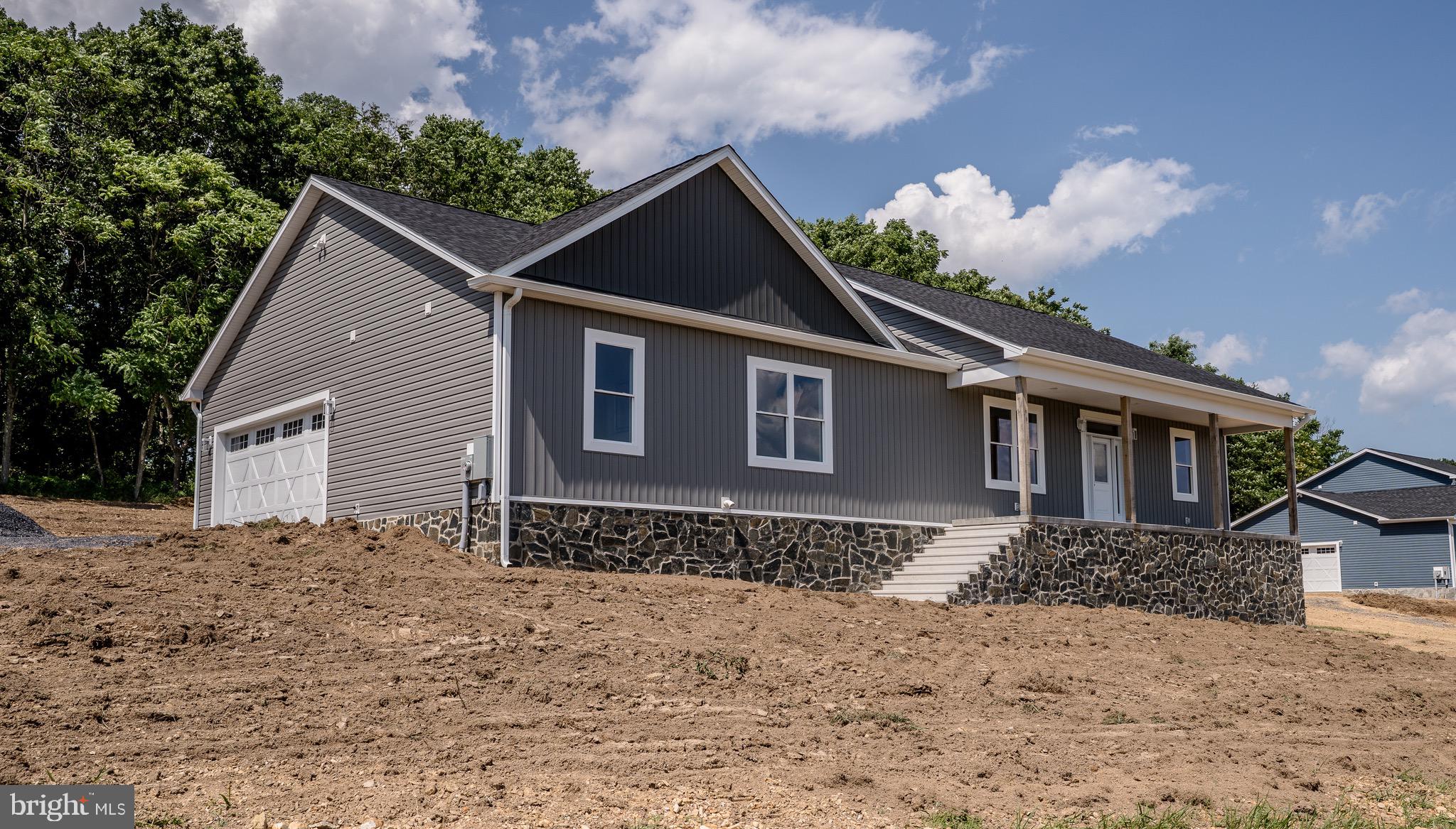 Charming New Construction Ranch Style Home on 2 Acres – Country Living at Its Finest!
Welcome to your dream home! Nestled on a picturesque 2-acre lot in a serene country setting on a dead end road with a cul-de sac , this brand-new ranch-style home offers the perfect blend of modern comfort and peaceful rural living. Need to be close to the VA or major commuter routes? This property has you there! With 3 spacious bedrooms and 2.5 beautifully appointed bathrooms, this thoughtfully designed residence is ideal for anyone seeking the tranquility of wide-open spaces.
Step inside to discover an open-concept layout filled with natural light, high ceilings, and premium finishes throughout. The kitchen features stainless steel appliances, quartz countertops, perfect for entertaining or quiet nights at home. The adjoining living and dining areas flow seamlessly, offering a warm and inviting atmosphere.
The primary suite is a true retreat, complete with a walk-in closet and a luxurious en-suite bathroom with double vanities, and a separate tiled shower. and luxury heated floor. Two additional bedrooms share a full bath, and a convenient half-bath is located off the main living space for guests.
Enjoy the outdoors from your covered front porch with an expansive view of your private acreage – ideal for gardening or simply soaking up the peace and quiet.
With brand-new construction built with Superior Walls, this home is move-in ready and built to last. Don’t miss your chance to own a slice of country paradise with all the modern conveniences you need.