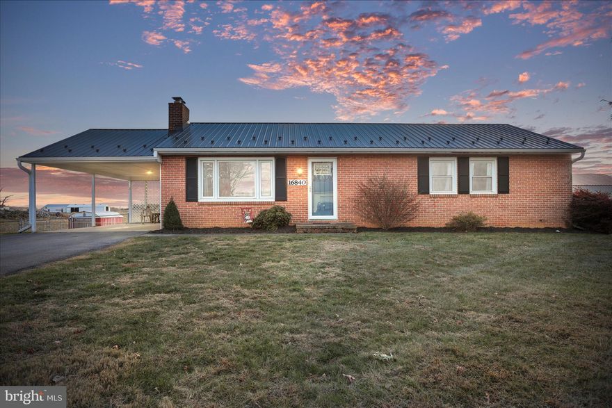 Look no further because this charming brick rancher has what you're looking for! Situated in a lovely "circled" neighborhood that's tucked sweetly off the main paths. The main level offers updated flooring  in the kitchen, hardwood flooring throughout the rest, separate dining area, spacious living  room with wood-burning brick fireplace, 3 bedrooms and full bath with updated flooring. The lower level offers a full bath, nice-sized room perfect for a rec room or family room and 2 other rooms (with fresh paint and new flooring) that would be ideal for hobby/crafting rooms/play rooms/work-out rooms, laundry room with utility sink, plenty of space for storage and walk-out access to the  rear yard. The home is truly move-in ready providing many updates/upgrades like lvp flooring, fresh paint, newer windows, metal roof and more! And you'll love the outdoor space it offers providing you with the ideal scene to relax, unwind and play with a patio off the rear and large fenced yard backing to fields, Don't let this one get away!