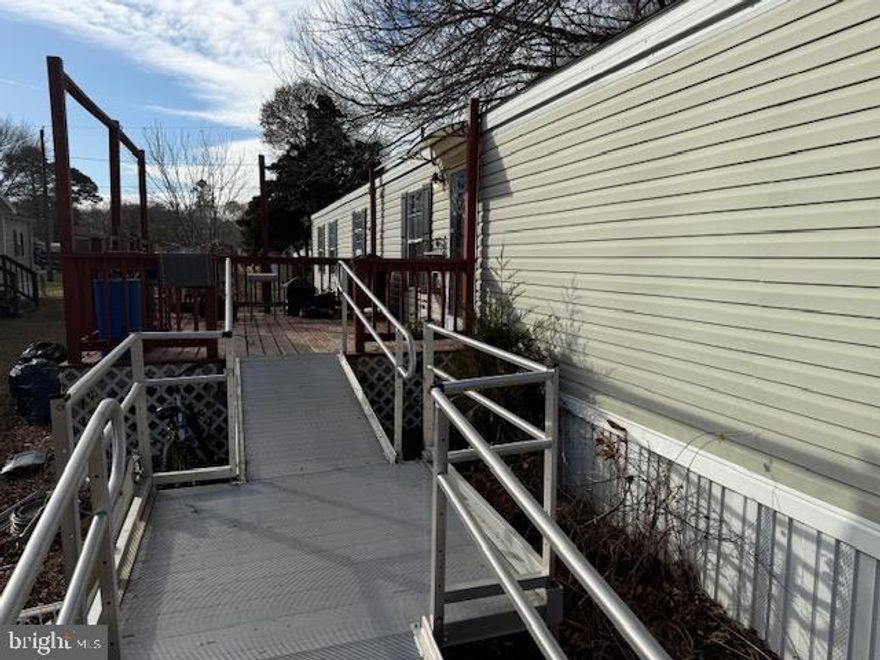 Welcome to Love Creek Park — a waterfront community offering a marina, boat slips, and a convenient boat ramp, all just minutes from the beaches, dining, and shopping. This 1990 single-wide mobile home features 2 bedrooms and 2 full baths and offers an affordable coastal lifestyle with low lot rent.
The home provides a comfortable layout with a primary bedroom featuring an ensuite bath and walk-in shower, along with a well-sized secondary bedroom and full hall bath. Enjoy outdoor living on the large deck, perfect for relaxing or entertaining. Additional benefits include a storage shed and off-street parking.
Love Creek Park provides a peaceful setting with direct water access, and the low lot rent makes this an excellent option for year-round living, or a vacation getaway. A great opportunity to enjoy waterfront community living close to Lewes and Rehoboth!