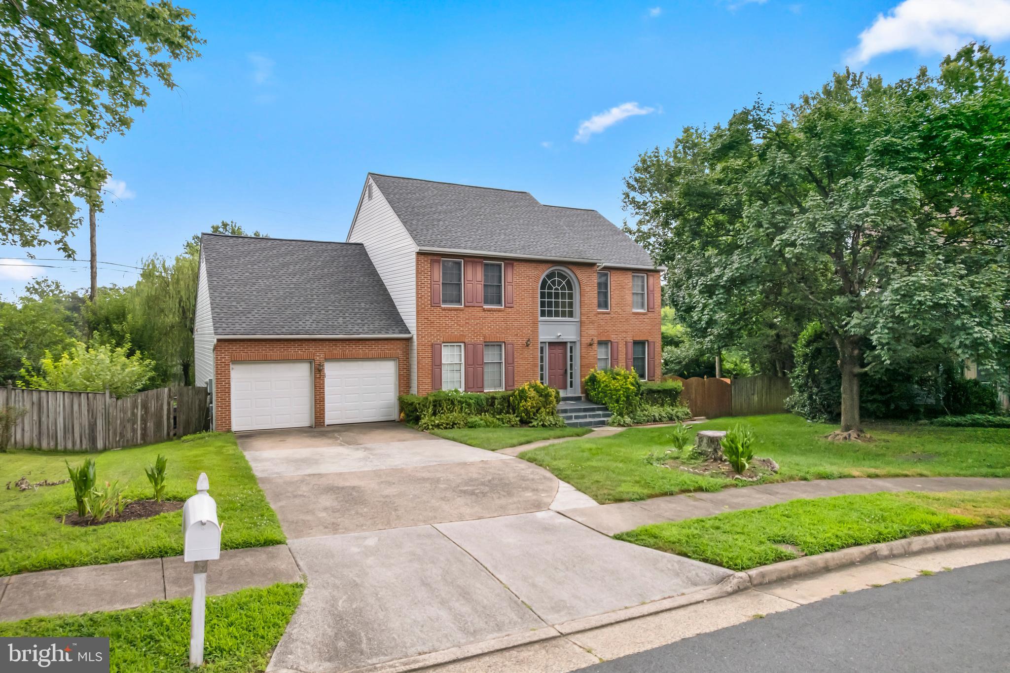 Welcome to this magnificent 7-bedroom, 3.5-bath Colonial, ideally situated in the Crestwood subdivision, straddling the border of Fairfax and Loudoun County. Boasting an estimated 4,700 sq ft of living space and a 2-car garage, this home offers unparalleled comfort and versatility.
The main level greets you with a grand foyer, leading to formal living and dining rooms, perfect for entertaining. A dedicated office/den provides an ideal workspace, while the expansive family room, with its soaring vaulted ceilings and striking stone-front fireplace, creates a warm and inviting atmosphere. The kitchen a delight, featuring a dual oven range, large island, prep sink, and abundant counter space. Completing the main level are a convenient laundry room, mudroom, and a powder room for guests.
Upstairs, discover four generously sized bedrooms, including a private primary suite with its own en-suite bath. Three additional secondary bedrooms share a well-appointed hall bath.
The lower level presents an incredible opportunity with a full in-law suite or potential rental property. This self-contained unit includes a complete kitchen, dining room, living area, three bedrooms, and a second laundry room. Direct walk-out access to the patio and backyard ensures seamless indoor-outdoor living.
Enjoy a prime location with easy access to major commuter routes including Route 7, Fairfax County Parkway, and the Silver Line Metro. Explore nearby Great Falls, the vibrant shopping and dining of Tysons Corner, and the charm of Vienna. Discover local favorites in downtown Herndon, such as the popular Friday Night Live free summer concert series, the lively Farmers Market, and direct access to the scenic W&OD trail. The Crestbrook community further enhances your lifestyle with an extensive walking and biking trail system winding through miles of picturesque parkland. You will truly love living in Crestbrook – don't miss this exceptional opportunity!