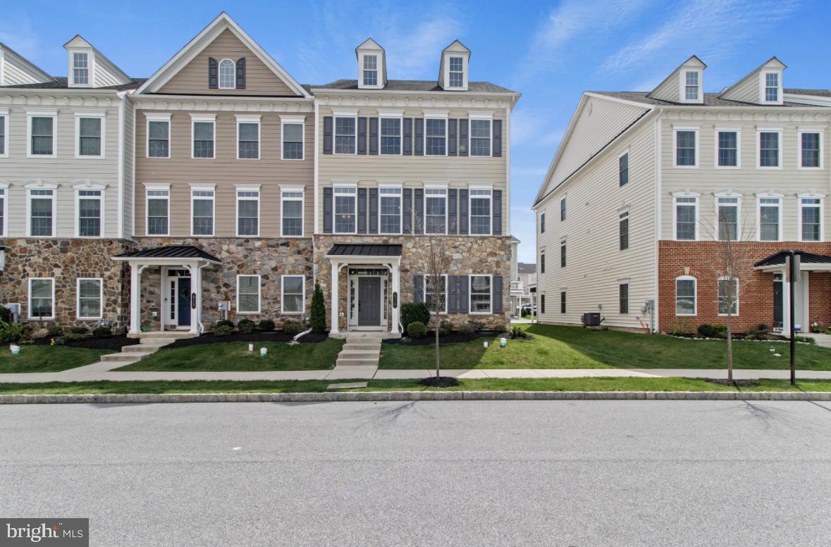This stunning, meticulously maintained end-unit townhome offers the perfect blend of luxury, convenience, and thoughtful upgrades. Andrew Carnegie Grand model built in 2019 by the original owner, this home features 9 additional windows that flood the space with natural light and showcase high-end finishes throughout every level. Step inside to find a flexible entry-level layout with custom touches, including upgraded LED lighting, added recessed lights, and a mudroom area with epoxy-coated garage floors (2021). The attached two-car garage offers generous storage, and ethernet ports plus a ceiling-mounted wireless access point ensure seamless connectivity throughout the home. Upstairs, the open-concept main living level features wide-plank walnut hardwood flooring, a gas fireplace, and elegant custom floating shelves (2020). The gourmet kitchen is the heart of the home—designed for both entertaining and everyday living. Highlights include: 42” upgraded white shaker cabinetry (all wood with dovetail corners & soft-close features) Quartz countertops, including a massive 13-foot center island with seating Stainless steel farmhouse sink GE 5-burner gas cooktop with double oven Custom tile backsplash Pendant and under-cabinet LED lighting Modern cabinet hardware. The adjoining dining area is perfect for entertaining. The Kitchen open to Family Room flows seamlessly to the deck—perfect for enjoying morning coffee or entertaining guests outdoors. Upstairs, the private bedroom level features three generously sized bedrooms, two full bathrooms, and a laundry area with front-load washer and dryer (2019). The luxury owner’s suite is a true retreat, featuring a tray ceiling, two walk-in closets, and an upgraded en-suite bath with Quartz countertops, Soaking tub, Glass-enclosed shower with custom tile, Double vanity with upgraded cabinetry. Other thoughtful upgrades include custom blinds throughout (2019), Hunter ceiling fans in all bedrooms (2020), a whole-house humidifier (2021), and a walk-in pantry. The home is located near the community’s largest playground and walking paths that lead to local favorites like Wawa, Avola Kitchen & Bar, and Chesterbrook Academy. Located in the award-winning Great Valley School District. A truly modern, efficient home with every detail considered, and one of the most desirable locations in Malvern—minutes from the PA Turnpike, Route 202, Route 29, and more.