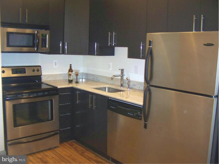 Terrific industrial 1 Br/1 Ba condo in renovated old school house in Fells Point. The property features: original wood flooring, 12' ceilings, grand moldings, gourmet kitchen with SS appliances, exposed industrial ducts, private common area courtyard. Close to restaurants, shopping, Inner Harbor, Downtown, major highways, hospitals.