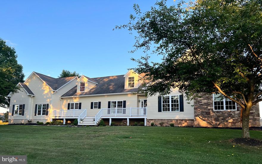 Over 6000 sq-ft sitting  of  gorgeous, renovated space on almost 2 acres with AMAZING views  in sought after Mt. Airy! Spacious, open floor plan with new gourmet kitchen, quartz counters and a slider that  floods home with natural light and leads to dual outdoor living spaces ( a 24x22ft deck and enclosed porch).  Spacious family and dining room off of chef's kitchen. Huge formal living  room, a private office, 5th bedroom, full bath, half bath, mud/laundry combo complete main level. Upper level offers 3 additional bedrooms, full bath, a primary bedroom and ensuite boats a  grand shower. Huge In-law suite with  new full kitchen, full bath, living room, two additional finished rooms, storage and walk out complete the lower level. Large detached 36x40 barn with electric and "she shed "is perfect for a workshop or business owner. This home overlooks hundreds of acres of beautiful farm land. There are so many updates in this home: Well pump replaced-2021, LVP flooring installed on first floor and bottom floor- 2021, complete bathroom renovation on main level, fully remodeled primary kitchen/ new appliances and new secondary kitchen in the in-law suite.  A must see!