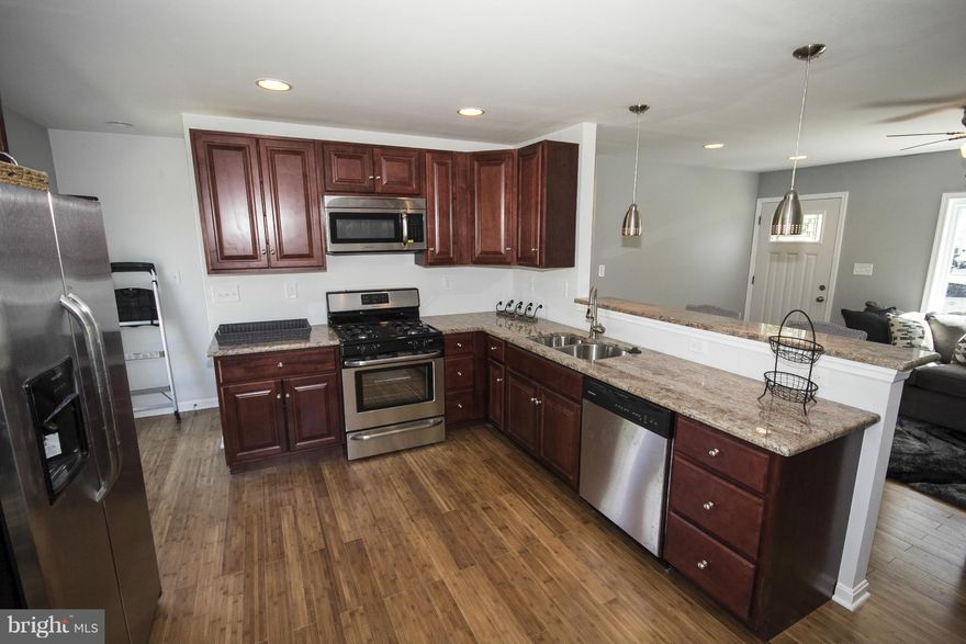 GORGEOUS RENOVATED RANCHER WITH 4 BEDROOMS & 2 BATHS. BETTER THAN NEW!!  NEW ROOF, WINDOWS, ELECTRIC, PLUMBING, FURNACE, WATER HEATER, KITCHEN CABINETS, GRANITE COUNTERS, STAINLESS STEEL APPLIANCES, HARDWOOD FLOORS, TILE BATHROOMS, VANITIES, DRIVEWAY. NOTHING HAS BEEN LEFT OUT IN THIS BEAUTIFUL HOME.  DON'T MISS OUT!! SEE IT TODAY!