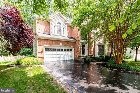 Photo of 5021 Whisper Willow Drive, FAIRFAX, VA 22030 (MLS # VAFX2292978)