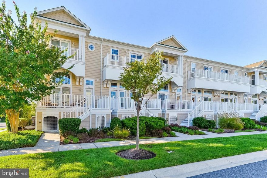Great location!! This 3BR/2.5BA unit sits in the tranquil Resort Community of Bayside, in West Ocean City. Highly desirable for it's convenient location and exceptional amenities - just minutes from Assateague Island and Ocean City beaches and attractions.  The unit's features are many and include 2 exterior composite decks, one on the 2nd level and one directly off the master bedroom suite, stainless steel appliances, breakfast bar, gas fireplace, active protection fire sprinkler system, private 2 car garage, and much more.  Come see this beautiful property with plenty of natural light, water views, well-maintained landscaping, and luxury amenities. Enjoy the indoor/outdoor pools, state-of-the-art fitness center, crabbing pier, tennis courts, playground, kayak storage, and  launching pier — excellent rental potential with established history. If you're looking for a move-in-ready home, look no further. This is your place!