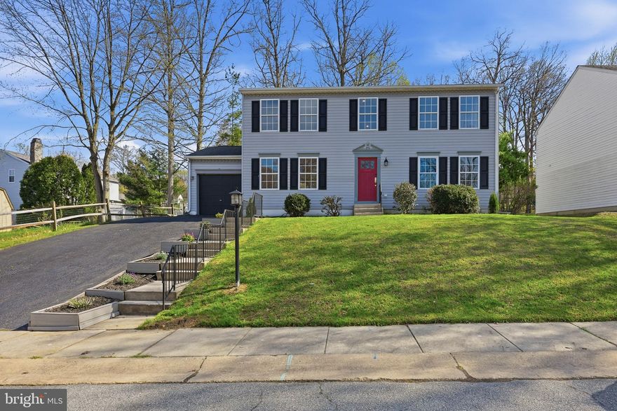 Welcome to this beautiful colonial style home nestled in the well establised community of Washington Woods.  This property boasts 3 spacious bedrooms and 2.1 bathrooms. Attention to detail is evident throughout the home with an array of impressive interior features. You'll be greeted by flourishing hardwood floors in the foyer, living and dining rooms. Enjoy a sunlit family room conveniently situated off the kitchen, perfect for entertaining with double French doors to the 23x16 composite deck. Enjoy eat-in kitchen with plentiful table space, newly painted cabinets and upgraded countertops. A formal dining room adds an extra touch of elegance. This property is not only attractive but practical too, gone are the struggles of storage with an accessible attic, and finessed organization from multi-functional walk-in closets. The exterior of the house is as impressive as its interior with a beautiful deck and patio, the perfect locations for outdoor dining or simply soaking up the sun. Additionally, the home is equipped with an interior sprinkler system and a 1 car garage. The property is conveniently located with access to dining, shopping and major routes, Rt. 40 and I-95, making it ideal for those who commute. Don’t miss the opportunity to own this jewel in Washington Woods. A classic blend of beauty and practicality, ready to offer a warm welcome to its new owners.  All appliances are included.