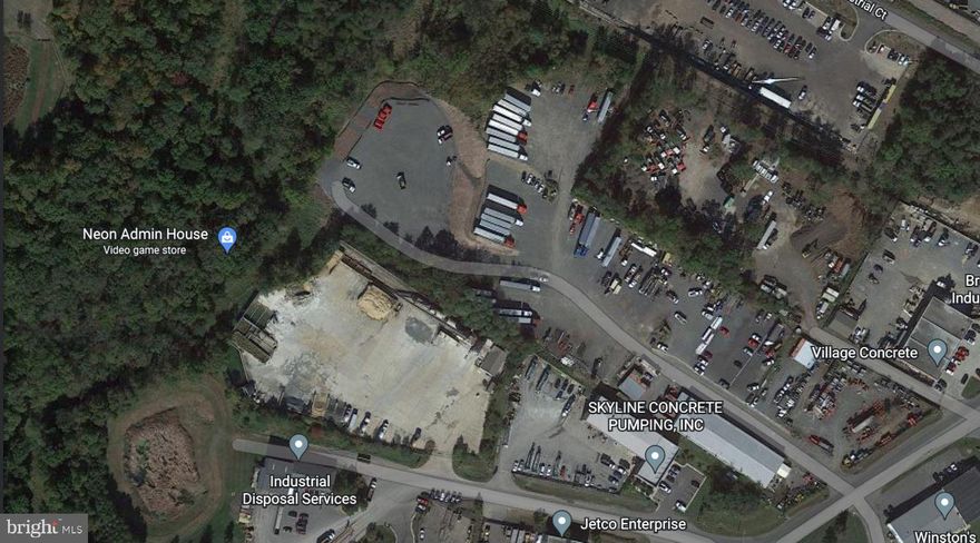 This site consists of two properties totaling 11.068 acres and in the process of being rezoned MT and should be completed 8-12 months. A very sought after location, the warehouse is approximately 12,000 square feet, drive-ins 12' x 14') and 18' ceilings in the warehouse space and a total of 4 bays and 1 is a double bay, all bays are air conditioned, and two of the bays have offices on the top floor.  There is Electrical Phase 3 available on site. Situated in a prominent industrial district, this property enjoys excellent visibility and easy access to major transportation arteries, including highways and interstates. Its prime location ensures seamless connections to the broader Virginia region and beyond. Basic utilities, including water, electricity, and sewer connections, are readily available, minimizing the setup time and costs for your operations. The location offers strategic economic advantages, including proximity to major markets and access to a robust transportation network, enhancing your company's competitiveness.  The many uses for M2, Brewery & Bottling, Bakery, Business School, Computer & Network devices, Gunsmith, Motor Vehicle Service, Warehouse, Tool & Equipment Rental Service and Repair, Moving and Storage, & More. Manassas is a dynamic and rapidly expanding economic center. As your business thrives, this property allows for future expansions and adaptations to accommodate your evolving needs. This property is in the Data Center Opportunity Zone Overlay District see brochure for Prince William County Overlay map. This site is less than a mile from the Prince William County Parkway and easy access to I66 & I95. Closing preferred in 9 to 12 months.  ***THE TAX RECORDS ARE FOR 11318 ONLY AND THIS LISTING INCLUDES 11350 INDUSTRIAL RD.***