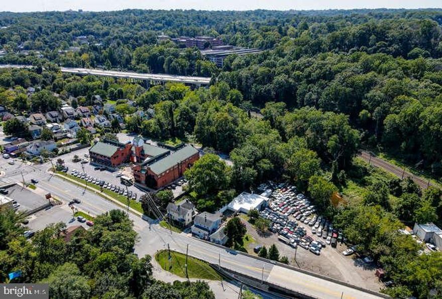 Business or investor opportunity. Commercial property is four parcel pieces including the structure with the shop. 2.5 acres in a rare prime location near Mount Washington. Phase 1 is complete. The existing structure could be any type of mechanical shop or landscaping company or any other business you can imagine. The 6500 square foot shop has parking for any vehicles and large commercial trucks.