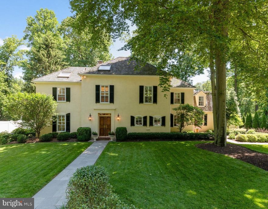 Don't miss this exterior lot in the highly desirable-The Woods!  This magnificent traditional yet open floor plan offers 4 beds, 3.5 bath, has been lovingly renovated/expanded and professionally landscaped to feel like your own European Villa. Enter through solid wood, double doors, to the center hall with a turned staircase.  The  sun filled Living Room boasts a wood burning fireplace, soft toned walls and custom white washed hardwood floors. To the right is the open kitchen/family and mudroom which is the heart of the home.  The Joanne Hudson designed kitchen features soft weathered finish Candlelight Cabinetry soft close drawers/doors, matching lazy Susan's, an expansive center island with bar seating and honed soapstone countertops, a farmhouse sink, Thermador appliances including a wood paneled refrigerator/freezer, cooktop/oven/griddle, additional under the counter oven, wicker slider baskets and built in microwave.  A custom copper range hood is the centerpiece for the Contessa Picket hand painted tile backsplash and walls. Adjacent is the dining/breakfast area with custom wall cabinetry/butler's pantry with wine fridge and icemaker, glass paneled cabinets and Contessa Savino tiled backsplash.  Off the kitchen is a large mudroom/powder room  which leads to a custom mahogany side entry & storm door set with a covered entry/walkway. The attached 2 car garage is upgraded with epoxy flake painted floors,  storage cabinets, a utility sink H/C and wall organizers. The heart of the home is the newly added family room which boasts a coffered ceiling and 6 arched double hung, Pella windows overlooking the rear property, and a  gas fireplace surrounded by custom built-ins. The adjacent Dining Room has custom painted wide stripe walls,  a brick surround gas fireplace and butler's pantry/wet bar with a hammered brass sink and gooseneck faucet.  French doors open to the grand rear flagstone terrace/backyard oasis.  Impeccably designed by Gale Nurseries the rear property is outlined with plantings, sculpted edging and landscape lighting throughout. The grand slate tiled terrace with limestone baluster railings open to a wide staircase leading to a level backyard perfect for playing sports or even a wedding! The first floor has a Bonus Room for home office or playroom.  The second floor Master Bedroom features a high tray ceiling, grass cloth wall paper, custom shuttered Anderson windows. The en suite Master Bath has ceramic tile floor & walls, a double vanity with granite tops, private commode, and an oversized custom tiled walk-in shower with pebble floor and open glass panel enclosure.  A large soaking tub sits graciously under a sky light yet has plenty of room for a makeup vanity outside of the walk-in closet/dressing room with built-ins. Down the hall are 3 additional generously sized bedrooms, 1 with an all white ceramic tile en suite full bath and matching Thibaut drapes/pillows and bath wallpaper.  The spacious guest suite offers 2 double door closets and a third single door closet. Bedroom 3 & 4 share the hall bath. There are 3 additional hall closets in the hallway with skylights and a 2nd floor laundry room with built in cabinetry, shelves and utility sink. A newly added walk up attic offers easy access to additional storage.  The finished lower level has a mirrored wall exercise area, children's playroom or home office with storage and mechanical rooms. Updated heating and A/C units, Roof replaced 2010. The Woods offers a well established, quaint family neighborhood with winding streets, cul-de-sacs, meticulously maintained yards and an annual block party.  A premier location, award winning Radnor Schools, minutes from Wayne, KOP mall, restaurants, major roadways and trains.  Click on the video tour!   Taxes may change as Delaware County is undergoing a county wide reassessment.