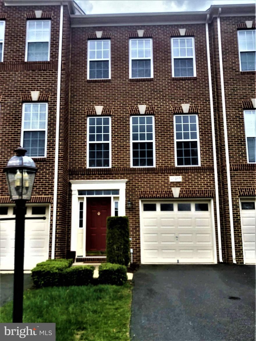 WELCOME HOME!  Gorgeous, remodeled garage townhome in popular Stone Ridge!  MOVE-IN READY! New luxury vinyl flooring, new carpet,  new granite countertops, updated cabinets, new dishwasher, stainless appliances, new light fixtures, new bathroom vanities.  Fresh paint throughout.  Garage level entry w/ bonus room (possible 4th bedroom) and full bath w/ sliding glass doors to fenced yard.  Open floorplan on 2nd level includes family room, dining area,  kitchen w/ breakfast bar, half bath and convenient laundry access.  Sliding glass doors open to spacious deck for entertaining!  New carpet in upstairs 3 bedrooms and 2 freshly updated bathrooms.  Stone Ridge offers newly renovated clubhouse w/ fitness center & rental space, amphitheater w/ event lawn, 3 pools, 5 tot lots, two tennis courts, basketball & multi-use courts and walking trails.  Walk to Harris Teeter, retail & dining.  Walk to Park-n-Ride to DC and Metro Station, Gum Spring library, New Stone Springs Hospital, shopping.  Minutes to Rt 50 & Rt 66!  WON'T LAST!