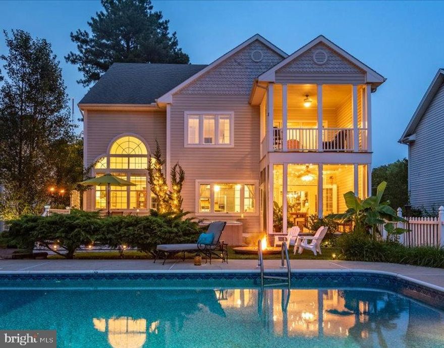 *** Buy this one before someone else does!  Open House this Tuesday evening  5 - 6:30pm.  Come take a tour & see it for yourself! ***  Welcome to the "Lake House".   This 4 bedroom Coastal Contemporary is truly one-of-a-kind!  If you have been looking for that "HGTV type property"...this is it!  This home has so many upgrades you'll have to ask your agent for the full list.  It's tucked away on a dead end street in the Salisbury city limits that many people don't even know exists and sits on one of the best lots nestled on the edge of the pine trees in "The Meadows": a quaint subdivision designed by renowned local architect Tom Becker on Johnson's Lake.  This home backs up to an open meadow and is just foot steps away from the water which gives you amazing views every turn you take.  The views are amazing and so is the boating and fishing!  When living in The Meadows you get private access to the lake and the amazing views that come with it without having to pay a waterfront price tag.  When you're in the back yard you don't even feel like you're in Salisbury.  A screened in brick porch leads to the over sized deck which winds down the stairs onto the beautiful manicured lawn and leads to a stone patio, fire pit, hot tub and an in ground salt water swimming pool.  If you're looking for out door living space and entertainment, you found the one!  The yard also comes complete with a in ground sprinkler system that runs off a separate well.  Inside is just as beautiful.  This home does not disappoint and the lay out of this home was strategically planned and designed by the current owners.  A grand family room with cathedral ceilings, dramatic windows, marble fireplace and custom moldings will make your jaw drop.  Hardwood floors, high ceilings throughout, large office, formal living area, formal dining room with french doors to the patio (open them up to feel the breeze when eating dinner), custom hand made kitchen cabinetry with bench seating in the breakfast area overlooking the pool and lake and so much more give this home its character!  You feel so relaxed when you're home.   You truly have to walk through the doors to experience it.  Walk up the stairs to be met with a huge master bedroom with vaulted ceilings and exposed beams that leads right to your private deck.   Again, the views!  Walk through the door and into the spa-like master bathroom with walk in closet, double vanity and soaking tub!  There are three other nice sized rooms on the second floor.   Peak around the corner of the second floor laundry room and there are hidden stairs that lead to the third floor great/game room!  Yes 3 huge floors of living space (this homes size is deceiving from the outside) and yes, the pool table conveys!  This room has it all!  Plenty of space for a play room, a media room and a game room all in one!  Plus, a huge storage room for future addition of a third bathroom or 5th bedroom if you choose.  Dual zone central air system with natural gas forced air system in the first floor.  This home is truly the total package and I can't explain it all - you just have to see it for yourself.   If you've been looking for "the one that has it all"...you've found it.  Schedule your private tour today.   (3rd floor finished sq footage is not included in the tax records - buyer to do all due diligence to verify size of rooms and total sq footage)