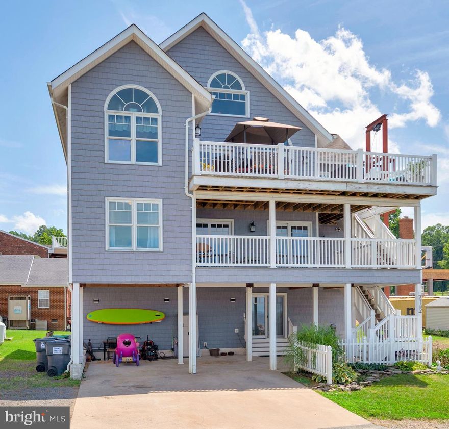 Beautiful waterfront home in small Potomac River Beach Community.  Stunning views from almost every room.  This home was designed  for entertaining family and friends both inside and out.  Multiple decks to enjoy both sunrises and sunsets on the water.  Loft master bedroom with walk in closet and water view.  Gorgeous master bath with huge jetted tub and luxury walk in shower.  Hardwood floors throughout most of the home.  Custom interior design features perfect for a river front home.  Brand new upper HVAC unit and hot water heater.  Roof less than 4 years old.  Exterior elevator in place that would be easy to finish or remove if desired.  Large corner lot with room for a garage or added parking.  Fairview Beach is a golf cart community with 2 restaurants, beaches, and a marina.  If you like to boat, fish, kayak, or just relax on the beach, this lovely home will make  a wonderful  year round residence or summer home. Seller is offering in As Is condition.