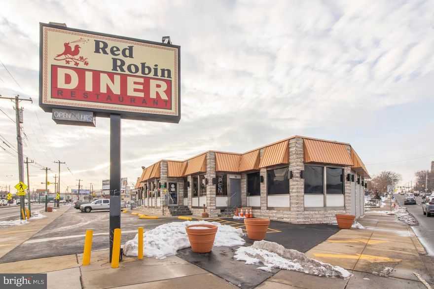 Don’t pass up the opportunity to make this charming  and currently operational diner your next investment or business opportunity! Having been owned for 40+ years by the same owners, this endearing diner is completely ready to go with all furniture and kitchen equipment included. Featuring a 134+ seat combination of booth, floor, and counter seating, this space is sure to please all while occupying its own triangular lot with a full parking lot. This property and business has been lovingly maintained by its owners and is complete with a full commercial kitchen with top-of-the-line stainless steel appliances and  2 clean multi-stall bathrooms. Features entry steps and a ramp. Come see this nostalgic diner and be a part of something truly special. Buyer to verify all potential uses with License and Inspection.