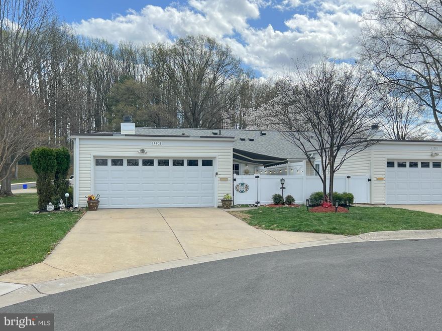 Leisure World one level living at its finest in private cul de sac location overlooking  blossoming trees, blooming flowers and pure nature. Take a stroll through this magical setting along winding sidewalks to enjoy all the ammenities Leisure World has to offer - including the theater, gym, pool, golf, eateries, grocery shopping, post office and more! If needed you can even visit a doctor here! This home is a rare find with it's private location and many upgrades!!  14703 Lindsey Lane offers a large 2 car garage with level entrance into the bright, cheery, spacious recently updated home. Soaring ceilings enhance the natural light abound in the spacious living area boasting new carpet, large windows, lovely fireplace, open floorplan , updated kitchen with all new appliances, new cabinets, 2 spacious bedrooms, large updated full bath with level walk in shower and side rail. New washer & dryer. Relax on your patio and enjoy the fresh air and sunshine, or shade, with your new automatic retractable Sunsetter awning!  This is the Leisure World Home you have been waiting for!