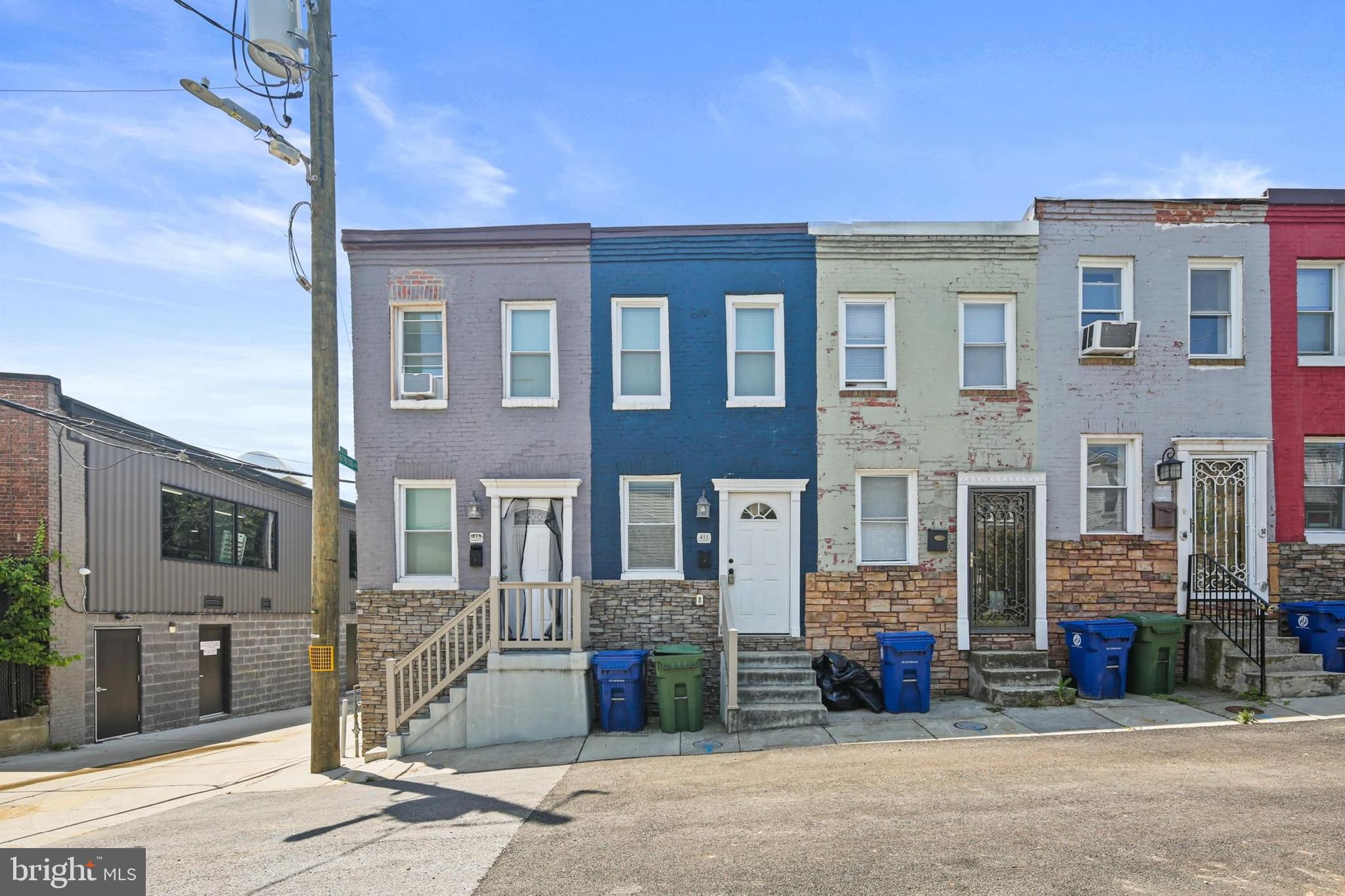 Welcome to 411 McAlister Street, a charming fully renovated 1 bed, 1 bath townhouse nestled in the vibrant Station North / Greenmount West neighborhood. Originally built in 1917 and updated to the studs in 2017, this home features a bright, open layout with hardwood-look vinyl plank floors, fresh interior and exterior paint, and a modern kitchen complete with stainless-steel appliances, dishwasher, microwave, and granite countertops. The primary bedroom includes a ceiling fan and built-in shelving in the shared bathroom. Convenience meets comfort with a stacked laundry in the bathroom and ample storage space. Step outside to enjoy a private rear deck and charming front garden, perfect for relaxing or entertaining. Lead-free certification will be provided. Ideal for city commuters, this home offers access to Baltimore City public schools and minutes from the University of Baltimore, MICA, Peabody, arts venues, and transit. Don’t miss out on this bright, turnkey townhouse in an arts-rich, pedestrian-friendly locale.