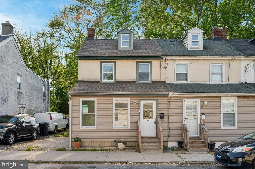 Welcome to 10 Upland in Brookhaven, PA, a home that feels far more spacious, warm, and inviting than you would expect at first glance, and one that offers the kind of everyday comfort that is getting harder and harder to find in this price point and location.

From the moment you arrive, you are greeted by off-street parking for two vehicles and a charming front screened-in sunroom, a perfect quiet space to sip your morning coffee, unwind after a long day, or simply enjoy a breeze without stepping out into the elements. Step inside and the home immediately opens up into a bright and comfortable living room that sets the tone for the rest of the property, relaxed, functional, and easy to live in.

The main level continues into a generous dining area and kitchen layout designed for real life. You have a large pantry for storage, a convenient main floor laundry setup, and a half bath all on the same level, making day-to-day living incredibly practical and efficient. From here, the home flows naturally to the backyard, where you’ll find a lush, fully fenced outdoor space that feels private and green, the kind of yard where you can picture pets running, summer evenings outside, or just a quiet escape from the day.

Upstairs, the second level features a spacious primary bedroom along with a full bath that includes a vanity, shower, and ample closet space. A dedicated hallway linen closet adds even more storage right where you need it. It’s comfortable, functional, and laid out in a way that just makes sense.

The third floor adds something special, a true bonus space. While the ceilings are more modest, the room easily functions as a second bedroom with closet space, two windows bringing in natural light, and enough room for a queen bed or flexible use as a guest space, office, or creative area. It gives the home versatility that many properties in this range simply do not offer.

The lower level basement provides additional storage and easy access to the boiler and hot water heater, giving you that extra utility space every homeowner appreciates but rarely gets excited about until they need it.

What truly makes this home stand out is the location. Nestled in Brookhaven, you are right on the edge of Delaware with incredibly easy access to major highways, shopping, restaurants, and everyday conveniences. Whether commuting, running errands, or heading out for a night, everything is close, simple, and accessible.

10 Upland is the kind of home that surprises you in all the right ways. It offers space, function, and flexibility, wrapped in a location that makes daily life easier. A rare opportunity to own something that feels both comfortable and connected, at a value that is becoming harder to find in today’s market.