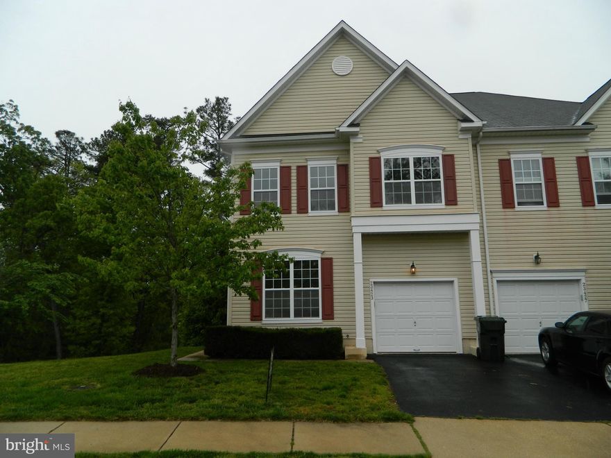 Wonderful Duplex in dahlia Park, backing to trees,close to playground,overflow parking area.  Freshly painted, new lighting fixtures, and ready for new tenants. Master suite with separate tub and shower plus two walk in closets, additional bdrms are lrg, 3 full bths, 1/2 bath on main, gas fireplace in family room, door leading to deck off kitchen, fully finished basement with rec room and office.