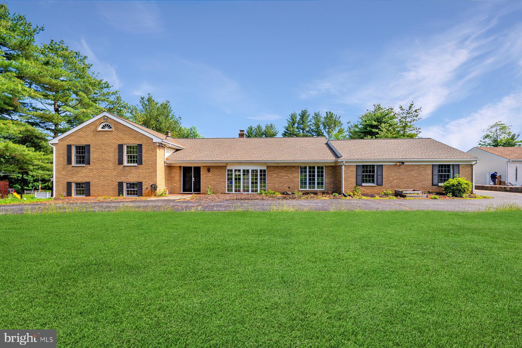 Set on a generous lot in a prime Ellicott City location, this split-level home offers three bedrooms and three and a half bathrooms, with three bedrooms upstairs and a fourth on the lower level. The layout includes multiple living areas, a large kitchen, a family room with fireplace, and flexible bonus spaces for work or guests. Outdoor features include a screened-in porch, covered patio, and a large backyard with room to relax or entertain. Located just minutes from Alpha Ridge Park and Patapsco Valley State Park, and close to shopping and dining at Long Gate and Chatham Station Shopping Centers, with easy access to Route 40, MD-29, MD-99, and I-70. A rare opportunity to enjoy space, setting, and convenience in Howard County.