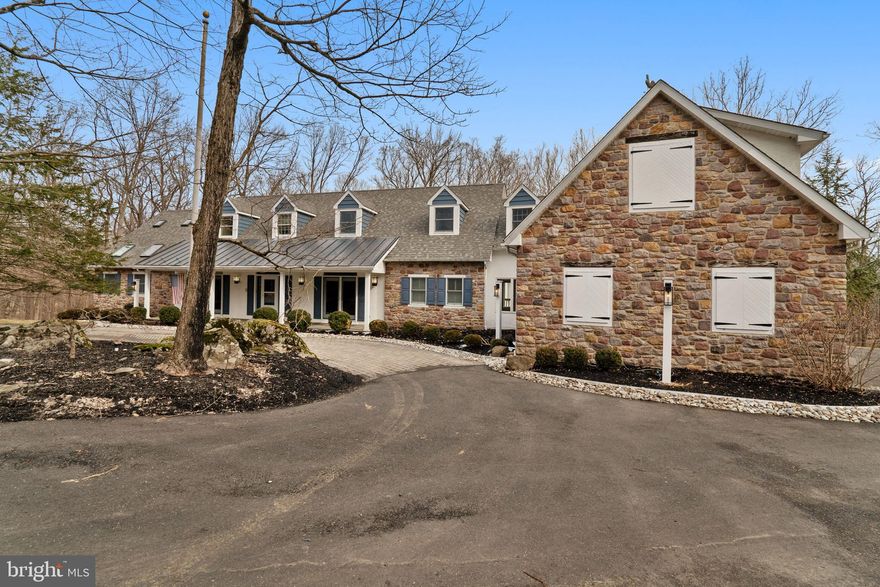 One of the most premier lots in all of Bucks County.  Stunning panoramic views of the Delaware River and Canal.  This expanded tri-level Cape Cod home is one of a kind custom built home by luxury home builder George Parry.  Home is perfectly situated on down a long driveway well off River Road.  Home is over 6,452 sq ft on a 3.44 acre lot.  Drive past beautiful professionally landscaped grounds which offers circular driveway leading up to home s beautiful stone exterior and covered front porch with metal roofing over main entry.  Home is a millwork masterpiece!  Walk into breath taking 2-story center hall foyer with beautiful crown molding and wainscoting which carries up the entire turned staircase.  Enter through beautiful French doors to formal living room on left, formal dining room to right.  Beautiful rich hardwood flooring which carries throughout entire 1st floor of home.  Walk past staircase leading to large open concept family room which includes an entire wall of windows which overlook the Delaware River and Canal.  Family room flows perfectly in brand new custom chef kitchen with large island.  Family room contains fireplace and sliding doors which lead to large rear deck with overlooks private backyard facing river, canal and naturalized woodlands.  Kitchen contains all custom 42" white cabinets with glass shelving at top with integrated lights in each cabinet.  Beautiful black granite counters with stainless steels appliances including convection wall oven and built in wine cooler.  Silver mosaic tile back splash with under cabinet lighting to perfectly compliment this modern dream kitchen.  Breakfast room off kitchen with large skylights allowing in plenty of natural light and 180 panoramic views of river.  Left wing of house contains a first floor with library, master bedroom which includes double walk-in closets, huge master bathroom and two separate heated four-season sitting rooms.  Right wing of house contains updated half bathroom, 1st floor laundry room, bonus room/mud room and inside access to 3-car attached garage.  Upstairs includes 4 bedrooms and 3 full bathrooms including the Au-Pair Suite with its own bedroom, full bathroom, additional kitchen and its own private entrance.  In addition to two-story foyer, there is also a back staircase off kitchen which leads to top floor.   Walk downstairs to fully finished lower level with built-in wet bar seating 5, made of rich mahogany and swing top counter for bar-back and additional fireplace. Lower level contains pool table, poker table, shuffle board which are all included in sale.  Lower level also contains a home theater room, exercise room with full bathroom with steam shower and a walk out entry to huge stone patio extending the length of home boasting of a country club like atmosphere.  Exterior rear decking and columns fully constructed with commercial grade top of the line Azek.  3 zone HVAC system (one zone for each of the 3 floors).  Back of property also contains a walking path leading to private bridge connecting canal to river to access all your toys on the water in the summer months.  Low taxes for property of its size and location.  Home offers complete privacy one 3 sides with Washing Crossing State Park to left and straight ahead some of the best water views in Bucks County.  Around the corner from Bowman's Hill Tower.  Incredible accessibility to all major highways such as 202 & I-95 to Philadelphia and New York.  Minutes to New Hope Boro and Lambertville restaurants and boutiques.  Homes like these do not come available often.  Home is the perfect mix of luxury and elegance...