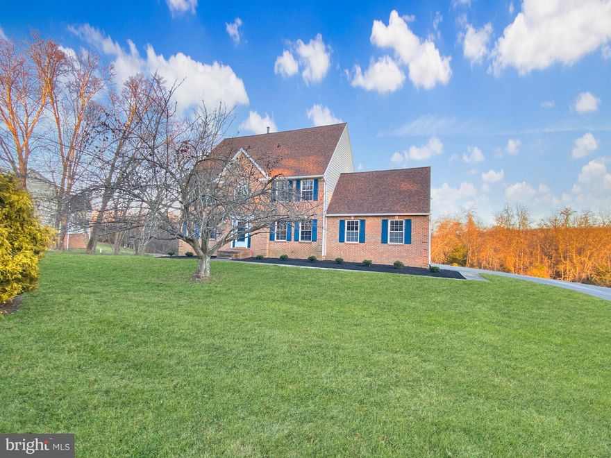 Seller is requesting all offers in by 6pm Tuesday 1/23. Pitcture-perfect brick Colonial home nestled on a stunning 3-acre lot in the heart of Clarksville. This spacious 5-bedroom, 4.5-bathroom single-family residence is perfect for families seeking comfort, style, and convenience. As you step inside, you'll be greeted by a grand 2-story foyer featuring a beautiful curved oak staircase and newly refinished hardwood floors. The spacious living room, adorned with 4 large windows, crown molding and recessed lighting, is perfect for daily living, home office, play room, etc. The formal dining room, to the right of the entrance foyer, features a beautiful chandlier, crown molding and wall accent lighting. The updated kitchen is a chef's dream, boasting double wall ovens, granite countertops, subway tile backsplash, and brand new stainless steel appliances. Enjoy your morning coffee in the sunny breakfast room, which overlooks the picturesque backyard. The stunning 2-story family room offers a dramatic wall of east-facing windows, flooding the space with natural light, and a cozy wood-burning fireplace for those chilly evenings. Exiting the family room, there is a 20' x 40' patio, perfect for outdoor entertaining and outdoor living. The walk-out basement level also includes a large bedroom, a full bathroom, and a utility/storage room. Upstairs, you'll find four generously-sized bedrooms, each featuring a ceiling fan or  light, and three full bathrooms. The primary suite offers a large walk-in closet and en-suite bathroom with separate shower and soaking tub for ultimate relaxation. The convenient upstairs laundry room makes chores a breeze. Recent updates also include new carpet on the main level, newly installed roof, freshly painted interior and exterior, new fixtures throughout. Ideally located within a highly sought-after river hill school district and close to commuter routes, you'll enjoy easy access to Baltimore, DC, and Annapolis. You'll also be less than 10 minutes away from a grocery store, pharmacy, restaurants, and a coffee shop. With ample parking for six cars, this impressive home has it all. Don't miss this incredible opportunity to call 13710 Highland Rd your forever home!