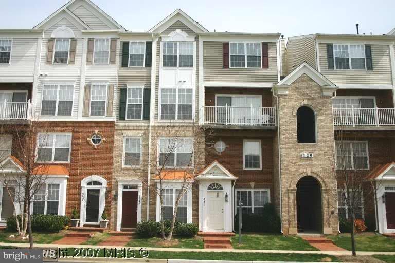 Lovely, sunny two level condo townhouse in this great community of Fallsgrove. Newer SS appls, hardwood-type floors on main level, beautiful fireplace in family room with built-in bookshelves on either side. The second level has two large bedrooms - MB has a great bath with double vanities, separate shower and tub. Community has a great neighborhood pool nearby.