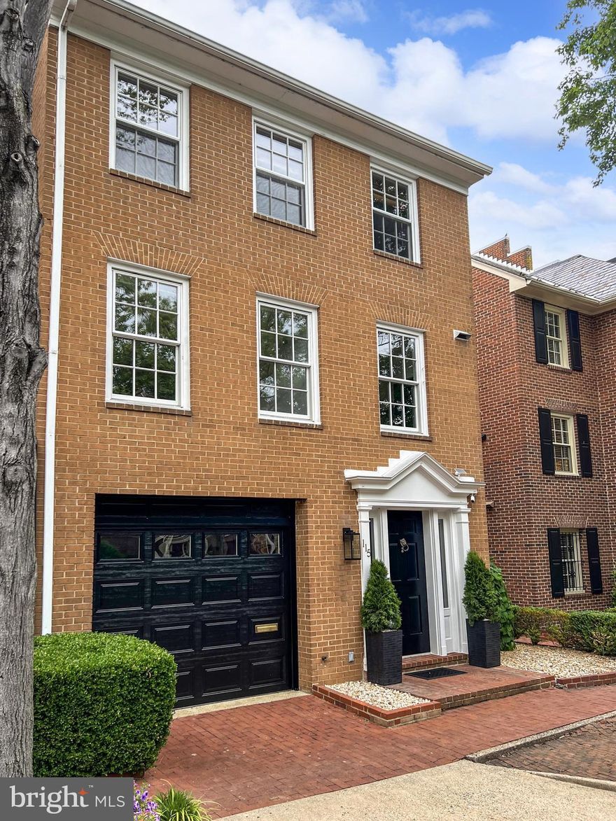 Beautifully renovated for contemporary living, this 3 level corner brick townhouse is located in the heart of Old Town just steps to Founders Park and the waterfront, and three blocks to the shops and restaurants of King St.  While the property offers 3 bedrooms, 2.5 baths and a lower level family room, the outstanding features in this exquisitely maintained and lightly lived in home are the 12’ high ceilings in the spacious living room/Great Room, a separate and full size dining area, and, a rarity for an Old Town townhouse – a stunning and exceptionally oversized landscaped patio and garden that just calls out for outdoor entertaining.  Features include a brand new primary bathroom (2024), a stunning modern white  kitchen (2018) with Wolf, Sub Zero and Bosch appliances, gleaming hardwood floors and marble foyer, a wood-burning fireplace, in-ground garden irrigation system, exterior patio lighting and extensive storage throughout.  Pull-down stairs lead to a full-height attic space currently used for storage but with potential for a substantial 4th level addition. Recent replacements include a new HVAC system (2024), re-lined chimney, solid wood interior doors and brand new bedroom carpets.  Completing this gorgeous home is a single car garage with new epoxy flake flooring, and driveway parking for a second car.  No HOA.