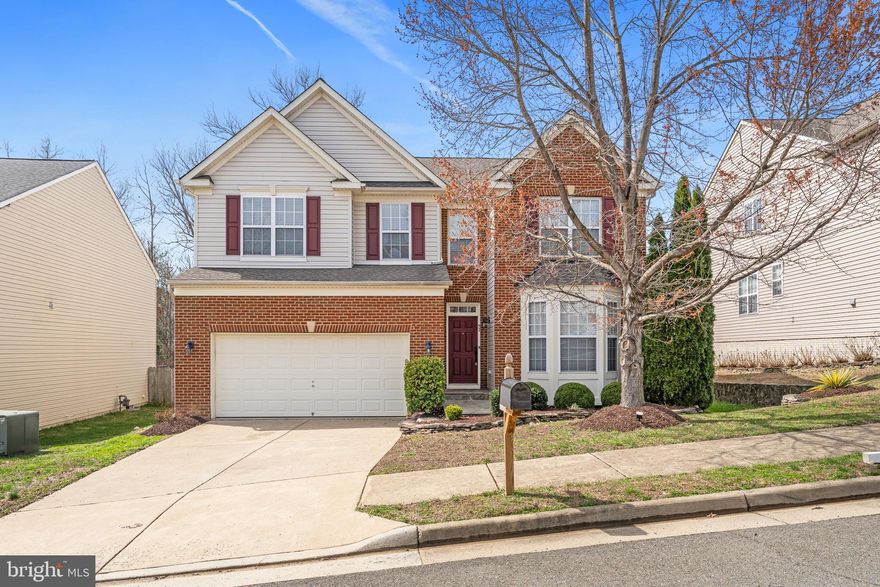 ​Opening the door to 57 Carriage Hill is like pulling the ribbon from a gift. The entryway foyer showcases an expansive visual flow all the way to the top of the catwalk. Four sizable upstairs bedrooms plus a main level bonus flex room with over 4,000 square feet of finished living space. Recently refreshed with brand-new carpet, a new half-bath vanity, a brand-new stainless steel double oven, a brand-new stainless steel dishwasher, full exterior power washing, and painting of all walls, doors, ceilings, and trim. Gourmet kitchen complete with abundant cabinets and table space. Captivating two-story ceiling in the great room with a gas fireplace. Oversized primary bedroom complete with two walk in closets, a garden soaking tub, and a tiled separate shower. Fully finished basement outfitted with a wet bar. Rear stamped patio ready for your finishing touches.  Roof was replaced less than two years ago. Hot water heater was replaced around 6 months ago. Additionally, an assumable VA loan is available at a truly historic 2.625% interest rate. Conveniently located for ease of commuting in and out with a distance of a little over a mile to Downtown Fredericksburg, 5  miles to the Spotsylvania Towne Center, and 20  miles to Quantico Military Base. This property is also zoned for the new Hartwood High School (Stallions) for the school year starting in fall 2026!
