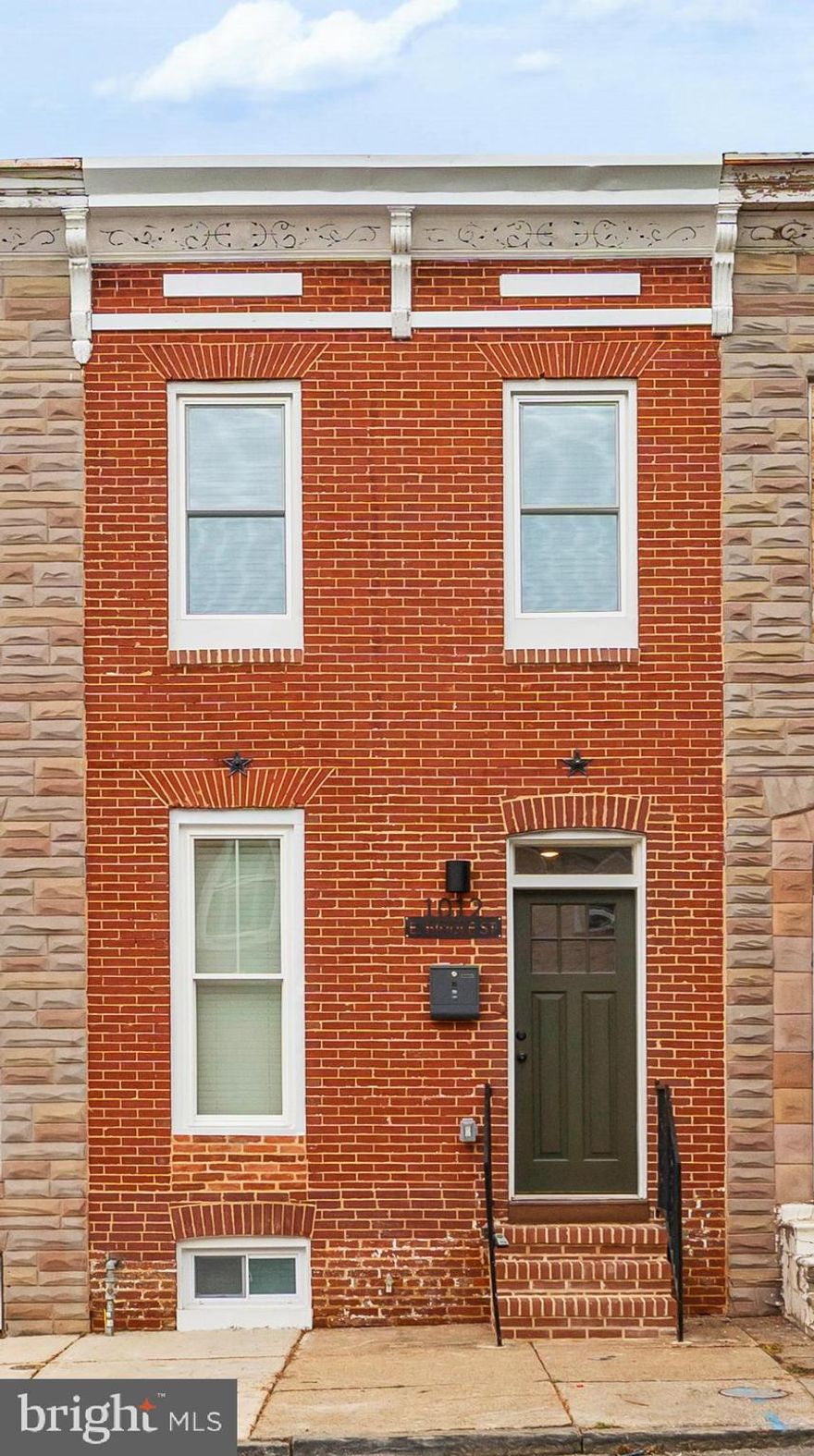 ***PRICE IMPROVEMENT***
🎉 Exciting News Alert! 🎉 This incredible home is your gateway to the fantastic **LIVE NEAR YOUR WORK GRANT** offered through Johns Hopkins University! We're talking about **up to $17,000** in down payment assistance! 💵💰But wait, there’s more! 🥳 Baltimore City's newly revamped **First Time Homebuyer Incentive Program** just launched and it’s a game-changer! You could receive **$10,000+ in forgivable grant money** to help make your dream home a reality! 💰✨ Imagine living in a vibrant **Buy Back the Block Neighborhood**! 🌟 And if you work for one of the participating Baltimore companies, you could also qualify for an extra **$2,500 matching grant**! What’s even more exciting? With **100% financing** options available, these amazing programs can be stacked for even **greater benefits**! Don't let this opportunity slip away—let's turn your homeownership dreams into a reality! 🏠💖✨

**Discover Your Dream Home Just Moments from Prestigious Johns Hopkins University!**
Welcome to this **exquisite, fully rebuilt Baltimore townhome**, where modern luxury meets classic charm. Every detail of this stunning property has been meticulously crafted, featuring new water lines, sewer lines, framing, walls, floors, windows, roof, electrical, plumbing, and more! This is not just a home; it’s a masterpiece waiting for you.

Step inside to a spacious living room, where a breathtaking fireplace serves as a focal point, inviting warmth and sophistication. The elegant, brand-new flooring flows effortlessly throughout the main level, creating an open and airy atmosphere. The kitchen is a culinary dream, complete with all-new stainless steel appliances, luxurious quartz countertops, and generous cabinet space for all your storage needs.
This thoughtfully designed home boasts **4 spacious bedrooms and an office**, ensuring ample space for family and guests. The main level features a serene bedroom with a full bath just off the kitchen—a perfect setup for visitors or family members seeking privacy. Access the **fully fenced backyard**, a tranquil oasis ideal for relaxation or entertaining under the stars. Venture upstairs to discover three additional bedrooms, including one with a spectacular en suite bath, providing the ultimate retreat. The fully insulated basement offers a cozy yet sophisticated entertaining area, complete with another fireplace, an inviting space for gatherings and cozy movie nights. Plus, a dedicated office space and a convenient laundry room add to the home's practicality.

Don’t miss the opportunity to call this **stunning townhome your own**! Experience luxurious living in a vibrant PREFERRED community, all within walking distance of Clifton and Patterson Park, and the esteemed Baltimore Museum of Art. Make your dreams a reality in this remarkable home!