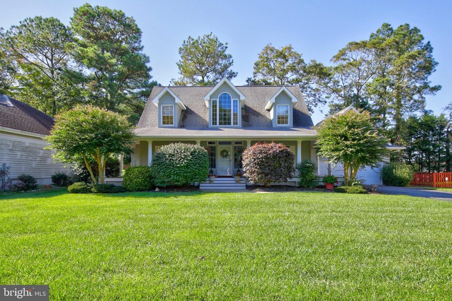 Gorgeous home _ Stunning Lot_ Amazing Community and has UPGRADES GALORE! Located in the highly desirable private West Ocean City community of Deer Point. Pristine 3 bedroom 2.5 bath Cape Cod with 2  car garage + BONUS 350sq feet finished bonus room over the garage!   If HOME is where the OFFICE is, this is the perfect spot .  Certainly no complaints for this morning commute. First Floor Owner Retreat with direct access to deck. Home Features hardwood floors throughout the main floor living areas, granite counters, stainless steel appliances, gas fireplace, recessed canned lighting, skylights, entry foyer, formal dining room, breakfast nook, walk in closets, unbelievable storage, pantry,  fenced yard, in-ground full yard  irrigation system, wrap front porch, recently replaced (2018) bi-level back deck with flat stone patio, privacy with mature landscaping.  West OC location has you minutes from the beach, Assateague Island, and America's Coolest Small Town, Berlin! Also close by to the West OC harbor and locals favorites, and the Ocean City Airport. This is a MUST SEE! All that's missing is you!