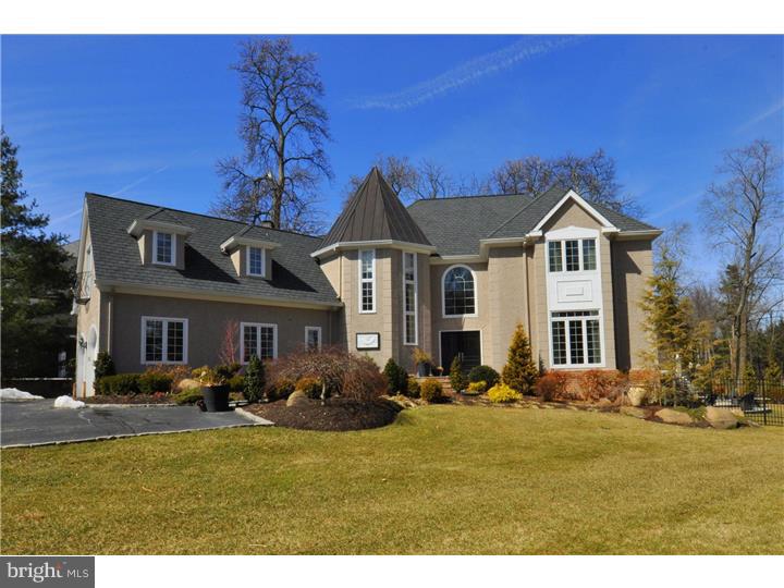 Unbelievable price for this exceptional custom manor home on a private corner lot on a cul-de-sac in prestigious Northside Villanova. Totally renovated under the direction of the Devon Group, this exceptional four bedroom home has every conceivable update and amenity imaginable. Exterior highlights include expanded rear deck with outdoor kitchen, hot tub, and pergola, extensive hardscaping with flagstone patio with firepit and brick walkway to front door, beautiful landscaping, and newer shingle and copper roof. The dramatic interior of this home features all new Pella windows and doors, new interior doors and hardware, new mahogany stair rail and balusters, granite kitchen with stainless steel appliances and breakfast room, private study, family room with walk in fireplace, formal living room and dining room, stunning new bathrooms, custom closets, and finished walkout lower level with exercise room, game room, and sauna. This flexible floor plan can be suited to fit every lifestyle and make this home the perfect place for entertaining and active family living. This home is centrally located just minutes from the towns of Villanova, Gladwyne, Bryn Mawr, and the King of Prussia Mall for local shopping and dining and is within close proximity to all major roadways for commuting to Center City or the airport. Must see today!