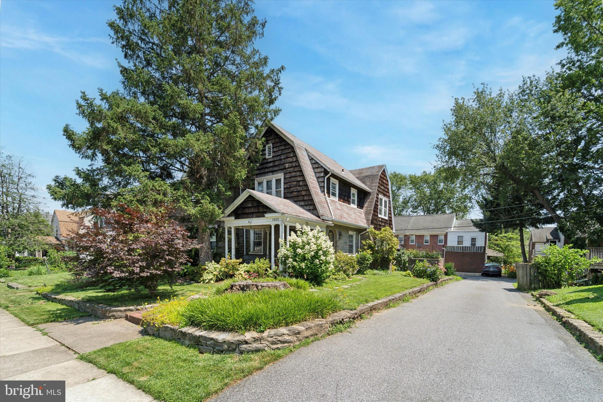 Charming and adorable, yet perfectly updated for modern comfort, this classic Penn Wynne Tudor twin is your fairytale-come-true in Lower Merion schools. A flagstone walk winds past the meticulous landscaping and covered porch to the arched front door. Welcome home! The living room is large and bright with original wood floors, stone fireplace (decorative only), and recessed lighting. The separate dining room has space to fit a table to host your crew. And the kitchen is not only a show-stopper, it’s incredibly functional too, featuring a Bertazzoni 6-burner range, vented hood, large farmhouse sink, and an insane amount of cabinet space. The second floor features three bright and spacious bedrooms, all with ceiling fans, and a hall bath. The tiled basement is finished with plenty of additional space for a playroom, home gym, office, etc., along with the 2nd full bath and laundry area. Doors from both the kitchen and the basement lead out to the garage in the rear. Additional features for your comfort and convenience include ample storage throughout, central AC, and custom blinds on all windows. Available Aug 1.