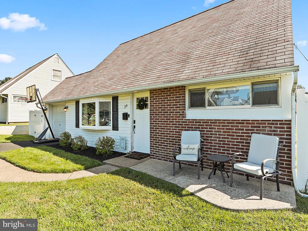 Nestled on a quiet circle road, this warm and inviting home beckons you to gather, create memories, and enjoy life’s simple pleasures. Just a short walk to Mill Creek’s natural green space — and with quick access to I-95 for an easy commute — you’ll love both the beauty and convenience this location offers. A partial brick exterior sets the tone for the comfort inside, where rich dark wood–colored luxury plank vinyl flows through the main living areas. The open living and dining spaces connect seamlessly to the modern kitchen, featuring crisp white cabinetry, granite countertop, a stylish glass tile backsplash, and stainless steel appliances. Throughout the home, a thoughtfully chosen color palette creates a soothing ambiance. Off the main living area, a spacious laundry/mud room links the home to the garage and back patio — the perfect spot for backyard barbecues and entertaining friends. The fully fenced backyard, enclosed with low-maintenance white vinyl fencing, provides privacy and includes a handy storage shed for tools and outdoor gear. Back inside, the main level has two comfortable bedrooms and a renovated full bathroom accented with elegant ceramic and glass tile. Upstairs, you’ll find two additional bedrooms and another updated full bath adorned with ceramic tile and natural mosaic stone for a spa-like touch. Offering the perfect balance of charm, modern updates, and everyday convenience, this home is ready for you to move in and make it your own!