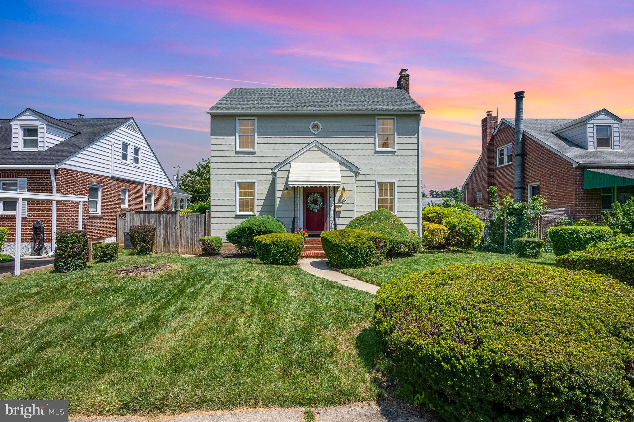 This charming home has been lovingly maintained by its longtime owner and features 3 bedrooms, 1.5 baths, and a dreamy backyard. The main level offers a spacious living room with decorative fireplace, separate dining room, and a bright, cheerful kitchen. The second floor features a generous landing, primary bedroom with attached half bath, two secondary bedrooms, and a full bath. The large, clean, waterproofed basement includes an upgraded washer and dryer, additional flush, and is perfect for storage or creating more living space. Other highlights include hardwood floors, a rear porch overlooking a beautifully landscaped backyard and a detached garage currently used for storage. Recent updates include chimney, gutters, and air ducts all cleaned (2025), exterior paint (2023), air conditioning unit replaced (2022), roof, furnace and water heater all replaced (2018), basement waterproofed (2018). This is truly a move-in-ready home full of character and thoughtful upgrades.