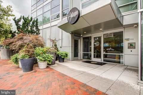 Photo of 6820 WISCONSIN AVE #8001, CHEVY CHASE, MD 20815 (MLS # MDMC2077090)