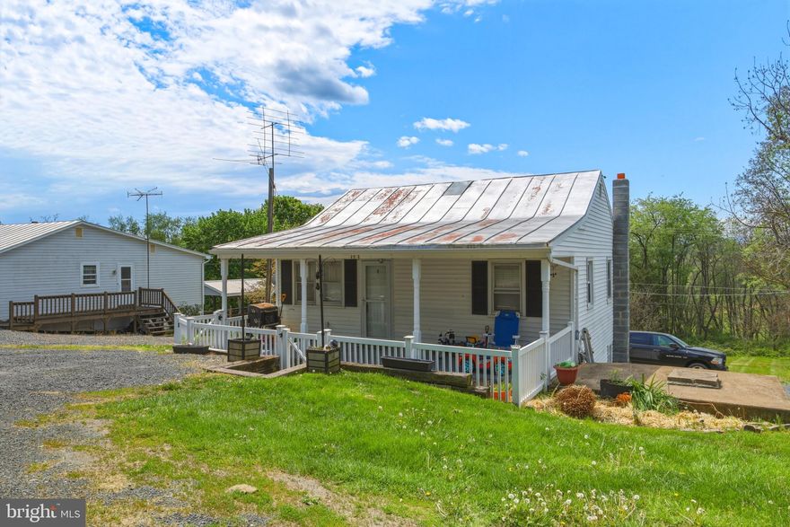 Charming Rancher in a Serene Country Setting - Nestled on a spacious 0.59-acre lot, this cozy 2-bedroom, 2-bath home offers over 930 sq. ft. of finished living space and has been beautifully refreshed with fresh paint and brand-new flooring on the main level, giving it a clean, modern feel from the moment you step inside.

The welcoming covered porch, fully fenced, is perfect for enjoying quiet country evenings. Inside, you’ll love the open-concept layout that seamlessly connects the kitchen, dining, and living areas — ideal for everyday living and entertaining. The updated kitchen flows effortlessly into the pantry area, with a full bathroom conveniently located nearby. The main-level bedroom is situated just off the living room for easy access and comfort.

Head down the charming spiral staircase to the fully finished basement, where you’ll find a second full bath complete with a stacked washer and dryer, along with another bedroom just down the hall. A basement door provides direct access to the backyard and a handy storage shed — perfect for all your outdoor essentials.

Enjoy peaceful country living with thoughtful updates already in place. This one is ready for its next owner — schedule your showing today!