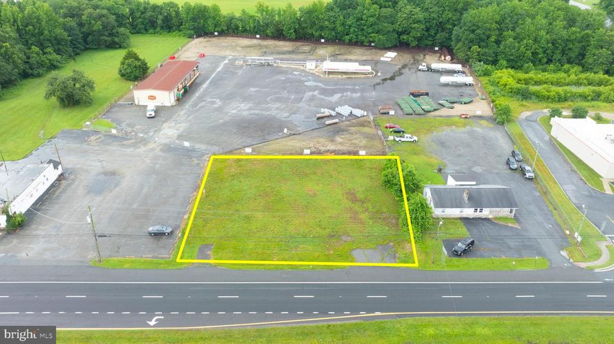 VACANT COMMERCIAL LOT on 1/2 acre. PUBLIC SEWER AND WATER ALREADY TIED IN! Kent Co. Sewer and Tidewater Utilities. This lot originally had a structure and has since been removed. This is cleared land ready for your business with mass exposure situated directly on Hwy Route 13 just outside of city limits on the Southbound side. Potential business uses with BG  Zoning is: Retail, professional services, contractor's establishment, storage, gas station, vehicle sales, restaurant, doctor's office, tube style car wash, etc. Previously there was a salon located here.