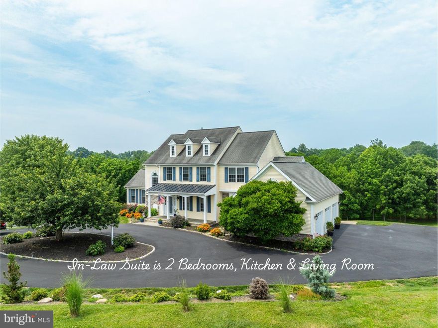 Amazing home priced to sell!  Come visit our open house this Sunday 6/29 2-4pm. 
 Completely Remodeled, Feature-Rich Home with Stunning In-Law Suite – A Rare Find in Hamilton, VA!

Welcome to this beautifully renovated estate offering nearly 5,000 finished square feet of thoughtfully upgraded living space on 3 private acres with high-speed internet and no HOA. This exceptional Hamilton property seamlessly blends luxury, comfort, and functionality—ideal for multi-generational living.

Inside, you'll discover one high-end upgrade after another. The heart of the home, the chef’s kitchen, has been entirely reimagined with 24” sleek tile floors, custom cabinetry, marble subway tile backsplash, and a Thor 6-burner gas stove with griddle and pot filler. Additional highlights include an oversized farmhouse sink, expansive quartz countertops, a bar area with wine fridge and glass-front cabinets, and clever storage solutions like a mixer lift cabinet and under-cabinet lighting.

Off the kitchen, the family room features rich hardwood floors and a stone-surround gas fireplace. The sunroom with soaring cathedral ceilings offers a serene space to unwind, while the enclosed side porch allows for evening relaxation—bug-free. The mudroom has been outfitted with new cabinetry, a stainless wash sink, and quartz counters for maximum utility.

Upstairs, the primary suite is your personal retreat. Enjoy a spa-like bath with a frameless glass rain shower, soaking tub, soft wood double vanity, and a beverage bar with a coffee station and fridge. Three additional spacious bedrooms with new luxury vinyl plank flooring and a beautifully updated full bath complete the upper level.

The walkout lower level is a showstopper: a fully separate in-law suite that feels like a luxury apartment. Completely remodeled with walls of windows for natural light, this space features a full kitchen (quartz counters, farm sink, large fridge, electric cooktop, microwave), 2 legal bedrooms, a gorgeous full bath with double vanity and glass shower, its own laundry area, and a private entrance via a solar-lit stamped concrete walkway. A private patio and open yard space make this suite a true oasis for extended family or guests.

Outside, the home is just as impressive. A massive Trex deck spans the back of the home—ideal for entertaining, with easy stair access on both ends. A fenced raised garden with pea gravel paths is ready for your green thumb, and a double-wide shed keeps tools and equipment organized. The 3-car garage includes a Tesla charger and ample cabinetry, while the newly paved circular driveway offers abundant parking. An invisible pet fence is already installed and includes 3 collars.

Meticulously updated and move-in ready, this rare Hamilton gem is a must-see for discerning buyers looking for flexible living options, designer upgrades, and unbeatable value.

Offers are welcome!