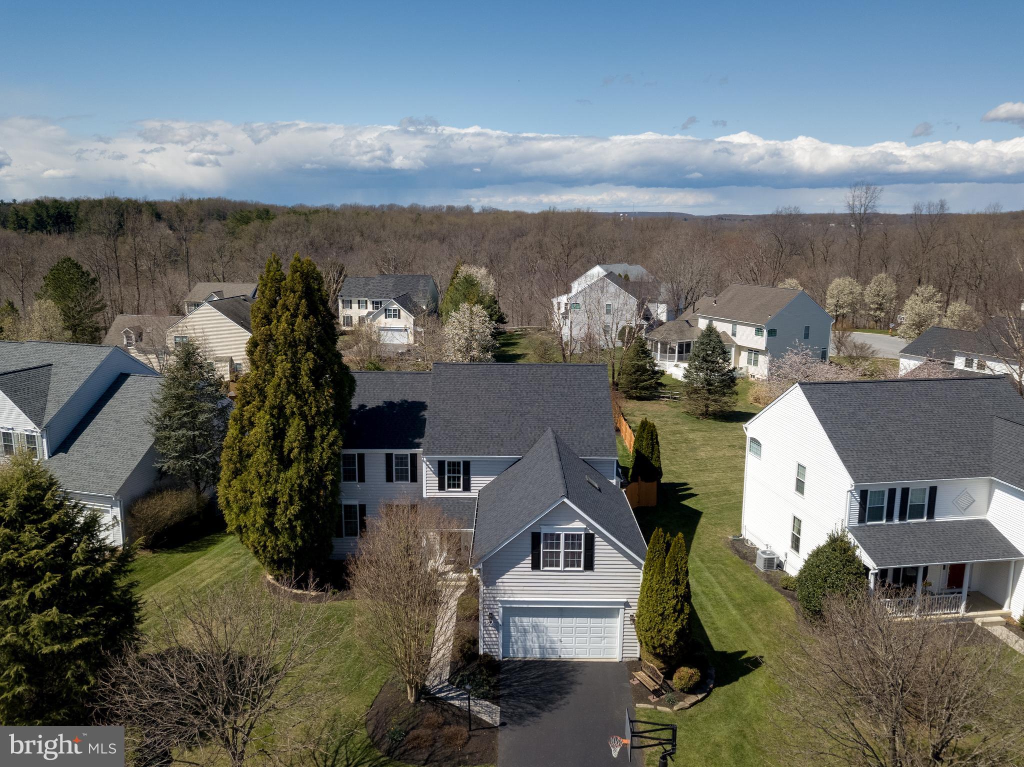 If You’re Looking for Perfection, Look No Further! This Gorgeous 6 Bedroom and 4 Bath Home Is Sure to Impress with its Impressive Outdoor Oasis and Fantastic Proximity to Patapsco Valley State Park. Enjoy Stunning Sunsets from the West Facing Fenced-In Rear Yard while Enjoying Your Heated In-Ground Pool, Lounging in the Gazebo, Enjoying Dinner on the TREX Deck Or Relaxing in the 6-Person, Salt Water Hot Spring Sovereign Hot Tub. Can you Imagine a Better Way to Enjoy the Upcoming Summer Days and Nights!?! Well How About being Perfectly Located Right Up Against Patapsco Valley State Park, Giving You Unprecedented Access to Great Mountain Biking and Hiking Right Out Your Back Door! Come see what this Riverwalk Community has to offer!
A Lofty Two-Story Foyer Welcomes You Home with Gleaming Hardwoods that Flows to the Adjoining Living Room and Into the Formal Dining Room Appointed with Classic Chair Rail and Crown Molding, the Ideal Setting for Hosting Your Evening Dinner Parties. Prepare Savory Meals in Your Gourmet Kitchen, Fully Equipped with a Large Island with Breakfast Bar, Sleek Stainless-Steel Appliances, Sparkling Granite Countertops, Electric Cooktop, Under Cabinet Lighting, and Plenty of Space for Your Morning Breakfast with Access to Your Outside Oasis, Simply Perfect. Step Down from the Dining Area and Find a Large yet Cozy Family Room with Gas Fireplace and Wall of Windows, Bringing in Plenty of Natural Sunlight. A Convenient Bedroom and Full Bath Create the Opportunity for First Floor Living if the Need Arises Or Use the Space for Your Home Office. A Mudroom with Access to the Two Car Garage and Second Staircase Completes the Main Level. Make Your Way Upstairs to Find the Owner’s Suite that Offers a Large Walk-In Closet, Vaulted Ceiling, and Full bath. The Primary Bath Offers a Spa-Like Retreat with Jetting Soaking Tub, Stand Up Glass Enclosed Shower, and Double Vanity. Four Additional Bedrooms, 2 Full Baths (One of Which Has a Skylight), and Laundry Room Rounds-Out the Upstairs, Giving You Plenty of Living Space All Around!
The Finished Lower Level Hosts Several Large Recreation Rooms with Pool Table, Air Hockey and Foosball Plus a Large Fitness Room as well as a Media Area perfect for Video Games or Movie Time! The Entire Space Flows in A Nice Full Circle and Comes Complete with a Full Bath Rough-In should you choose to Add Another Full Bath! The Lower Level Gives You the Opportunity to Create the Space of Your Dreams! Notable Updates Include: Brand New Carpet, Fresh Grey Paint, and a Newer Roof! You'll Find a Well Taken Care of Oasis, Perfect For the Way You Deserve to Live!!