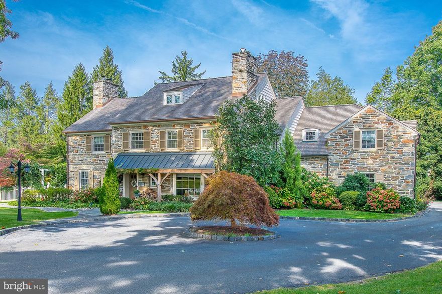 Stunning, stone, Main Line colonial on a private lane in one of Haverford's most coveted neighborhoods.  This beautiful property features lovely architectural details, well-proportioned sun-lit rooms and attractive landscaped grounds with a beautiful pool and outdoor entertaining spaces.  First Floor: large welcoming entrance hall with elegant staircase; living room with wood-burning fireplace and doors to patio; dining room with bay window; den/study with gas fireplace, bay window and built-in cabinetry; fabulous addition designed by Gardner Fox featuring a well-equipped kitchen with plentiful custom cabinetry open to breakfast room and family room with gas fireplace and doors to brick patio overlooking the secluded pool; formal powder room.  Second Floor: luxurious primary bedroom suite with bathroom and large his and hers walk-in closets; bedroom 2 with private bathroom; bedroom 3 with jack-and-jill bathroom to bedroom 4.  Third Floor: bedroom 5 with window seat; bedroom 6; hall bathroom.  Lower Level (which offers an additional approximately 1,000 sq ft of living space): second family room with wood-burning fireplace; temperature-controlled wine room; laundry room; gym; second powder room, unfinished area used for storage and a workshop.  This exceptional property is conveniently located for Merion Country Club and the shops of Haverford and is within an easy commute to Center City and Manhattan.