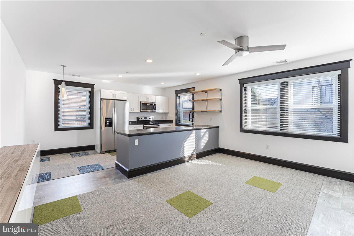 Discover the charm of this recently updated 2-bedroom plus den/office apartment nestled in the heart of Bryn Mawr. This inviting second-floor flat boasts a spacious open layout for living, dining, and kitchen areas featuring sleek stainless steel appliances, new cabinetry and quartz countertops. Two generously sized bedrooms with ample closet space offer comfort and convenience. The hall bathroom has been completely renovated with new tiles, vanity and tub/shower. This unit also includes a laundry closet with a full-sized washer/dryer, adding to the overall ease of living.
Embrace the versatility of the enclosed front room, creating the perfect in-home office, workout space, or cozy den. Enjoy the prime location just across from Bryn Mawr Hospital and the Septa Norristown High-Speed line, providing seamless access to public transportation. Public parking lot and street parking for residents for a small yearly fee for a Radnor Township parking permit.
Available immediately, this unit includes water in the monthly rent for added convenience. Smoking and pets are prohibited and the rugs in the living room and kitchen can be stored, if desired