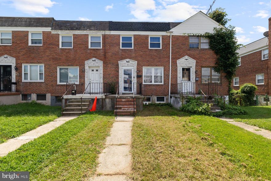 Classic 3BR/1BA Brick Townhome located on a tree-lined street in the Parkside neighborhood.  Make your way to the front porch and open the door into your forever home.  This home offers three floors of living space boasting original hardwood floors, and tons of natural light.  The main floor offers a spacious living room and a primary sized bedroom.  The second floor features two sizable secondary bedrooms and a full bath.  The lower level is where you will find the eat-in kitchen with a knotty pine feature wall, plenty of cabinets and counter space, stainless steel appliances, a stainless sink, and plenty of room for a dining table.  In addition, on the lower level is laundry, a powder room, storage, and from the kitchen a walk-out to the fenced yard.  The yard offers green space and off street parking for two cars.  This home is ideal for any new homeowner and is located in close proximity to shopping, restaurants, and commuter routes.