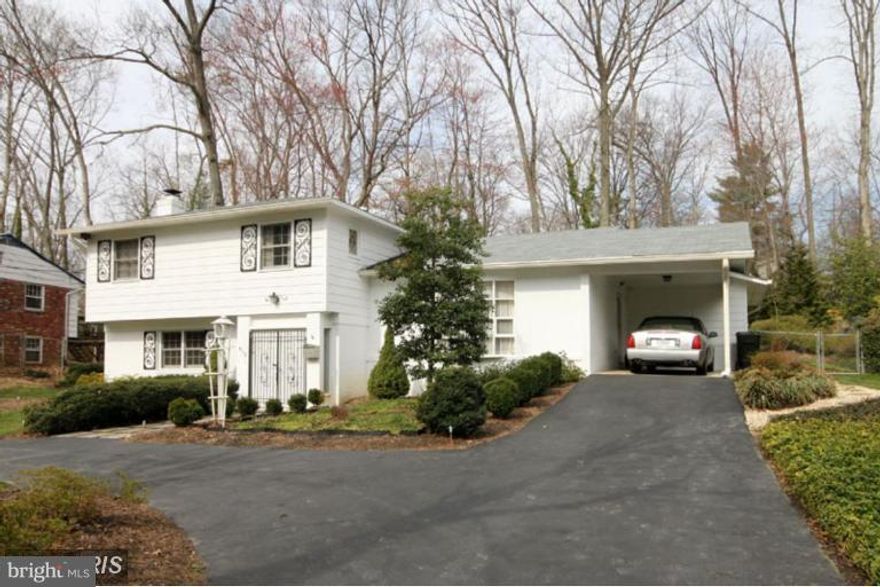 Best Value for 4BR/3 full baths, 4LVL split w/well over 3K finished sq ft in Woodson HS Pyramid! Picture perfect private lot w/mature landscaping. Updtd EIK w/island. Bright Sunroom. Amazing LV RM addition w/cathedral ceilings & flood of natural light! Separate MBR suite. 3LVLs HWDs protected by crpt. New Paint throughout & remodeled full baths in 2018. Near Pool, Parks, & Metro Bus.