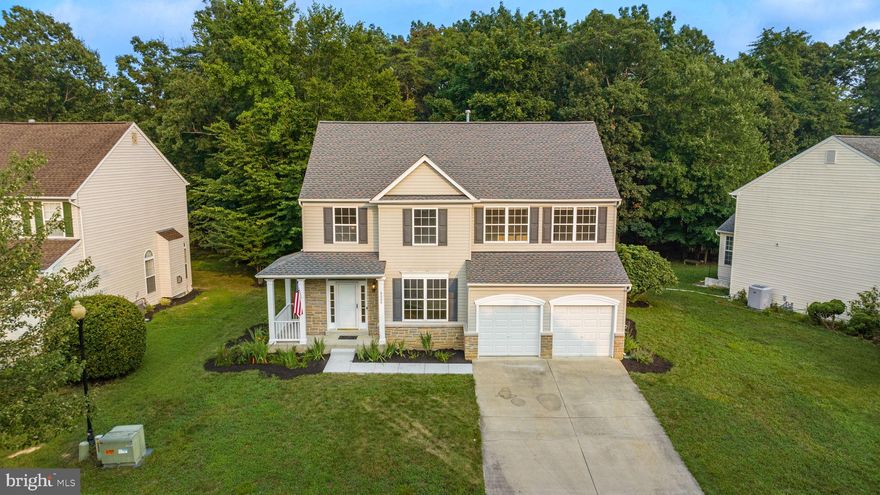 When you want your Realtor to check all the boxes and find the BEST home in this price point, don't be surprised when they take you to 8239 Bishops Gate Lane! Located  in the well established neighborhood of HIGHGROVE, this charming colonial is a MUST SEE!  The lot backs up to a Forest Conservation easement which insures a level of privacy from a lovely deck. The foyer is very welcoming to the front living room. A  first floor bedroom/ home office/flex  area is convenient to a bathroom for those who desire first floor living. Kitchen with deep sink and center island expands into large living space which gives access to the deck. Be the first one to step onto the new luxury vinyl plank flooring and carpeting throughout this freshly painted home. All upstairs bedrooms are spacious and ceiling fans in all bedrooms provide great circulation and even air flow. The Owner's Suite is huge, boasting a large closet and a Bath area fit for royalty. The original owner's have given great care to the future owner's by recently upgrading with new roof , new shutters and gable vents, new sidewalk to entry, new mailbox and water heater with tank booster. The basement is open and waiting for you to make it into your desired and original living space. Every maintenance endeavor that has been done will provide assurances to the future homeowners. So many wonderful features are nestled in this very sought after community which is convenient  to area commuting routes, military bases, restaurants and shopping. All the boxes are checked and waiting for you to discover that you are indeed HOME. All Offers will be presented on Monday 07/24/2023.