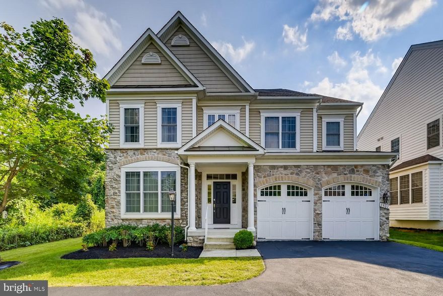 Beautifully maintained former Columbia Builders model, boasting over 3,500 square feet. Greeted by the double story foyer, this home unfolds to an open concept to the living and dining room with beautiful hardwood flooring throughout the main level. The kitchen is updated with all SS appliances and granite countertops. Backyard has views of the conservation area and deck access to the patio. The spacious family room has a marble gas fireplace with recently updated carpet. The abundant master bedroom on the second floor has two walk in closets, a sitting area, and a luxury en suite bathroom. Three graciously sized bedrooms, full bath, and a laundry room conclude the second story. The basement holds potential for additional two rooms, with newly updated basement wall to wall carpet, spacious recreation room, and separate access to the yard. The secluded corner lot provides exclusivity with an extended driveway with personal parking.