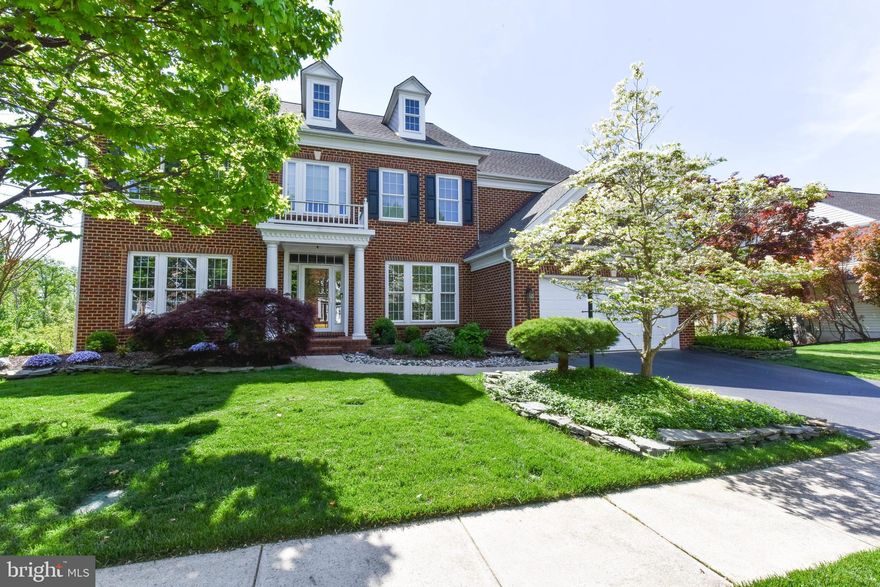 Upgraded and expanded Colonial! This is the larger model- tax records are not correct! New bathrooms, great open   floor plan; screened porch AND deck, gleaming hardwoods on main level; 6 bedrooms, breakfast room addition, deck, screened porch, landscaping/ private yard backing to trees; Min to Ft. Belvoir, I 95 and Parkway. Master Bedroom with Sitting Room.  FLOOR PLANS ARE LOCATED IN "DOCUMENTS" - note all of the choice for additional square footage have been optioned.