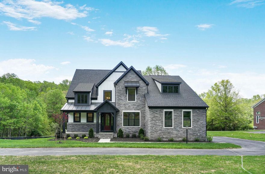 Beautifully appointed Sycamore home available for quick move-in at Stuart Mill! The open and airy main living level features an impressive kitchen with adjacent dining area, a separate study, a spacious dining room, and a huge great room that has a gas fireplace and sliding glass doors that open to the covered outdoor living. The Chef’s dream kitchen features Gunny cabinets, Calacatta Gold quartz countertops, a large island with waterfall, KitchenAid stainless steel appliances, and an enormous walk-in pantry.  The Kitchen also has a prep zone that connects the kitchen and dining room.  Upstairs you’ll find a luxurious primary suite featuring a large bedroom with tray ceiling, two huge walk-in closets, and its own private terrace. The second floor also has a secondary bedroom with private bath, two additional secondary bedrooms with Jack and Jill bath, a sizeable laundry room, and a cozy loft.  The lower level offers a large, finished rec room, an additional full bath, and a walkout.