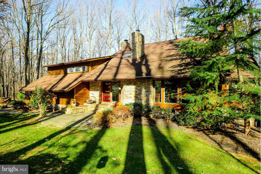 Pristine Stone & Cedar Contemp w/Open Floor Plan, Vaulted Ceilings & Lots of Windows to enjoy the views of the Park-like grounds* Custom Gourmet Kitchen w/Limestone Counters, Cherry Cabinetry, Island & Upscale Appliances & Amenities* Atrium Breakfast Rm* Adjacent Family Room w/Stone FP* Heated Sunroom* LR & DR w/Hrdwd Flrs* MBR Suite w/Priv Deck & Renovated MBA* Fin LL w/RecRm, 5th Br & Full Ba